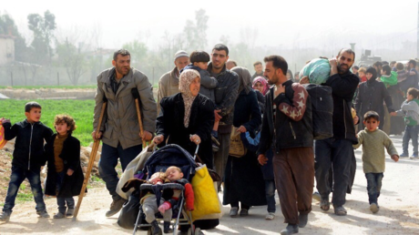 Over 30,000 leave militant-controlled E. Ghouta as people continue to flee for safety