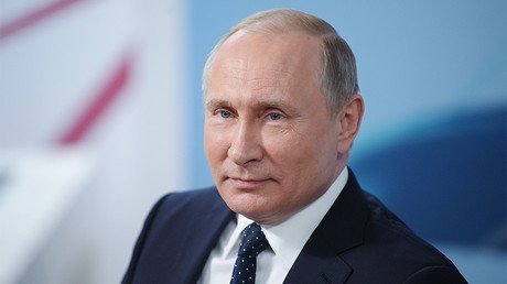 Vladimir Putin decisively re-elected as Russian president after 99% of votes counted