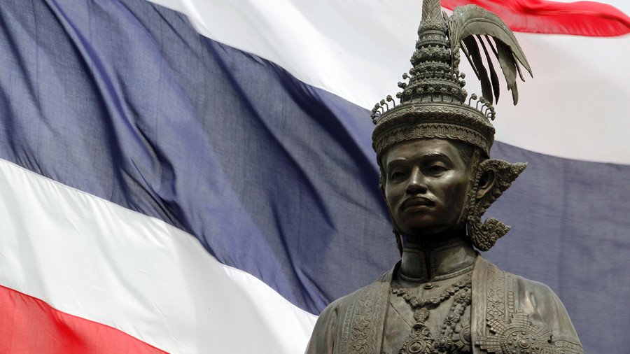 ‘Blasphemous act’: Editor faces 15yrs in jail after posting masked image of Thai kings online