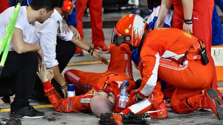 Ferrari F1 mechanic breaks leg in grisly pit stop accident (GRAPHIC VIDEO)