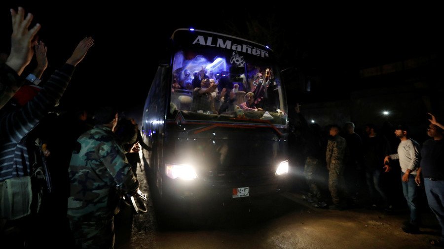 Thousands of Jaysh al-Islam militants leave Syria's Douma, release POWs
