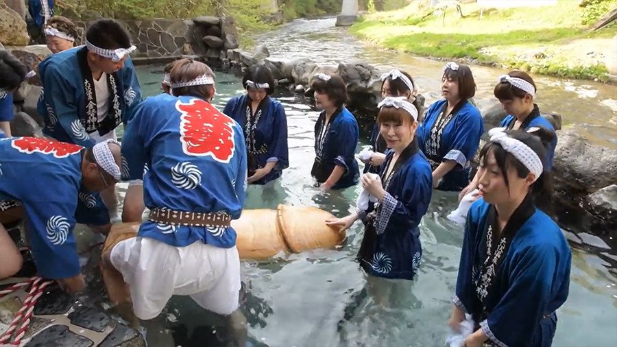 Big in Japan: Giant wooden penis carried down mountain for fertility fest (VIDEO)