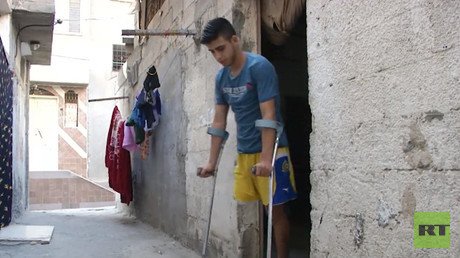 ‘I didn’t think my leg would be like this’: Gazan who lost limb in IDF sniper fire talks to RT  