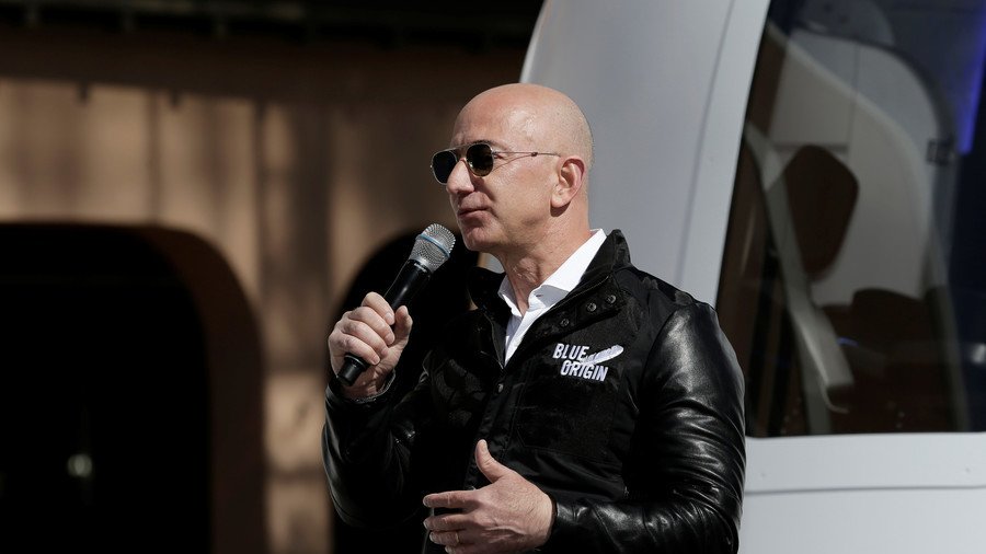 Back to earth, Bezos! Amazon chief under fire for space travel plans as workers struggle