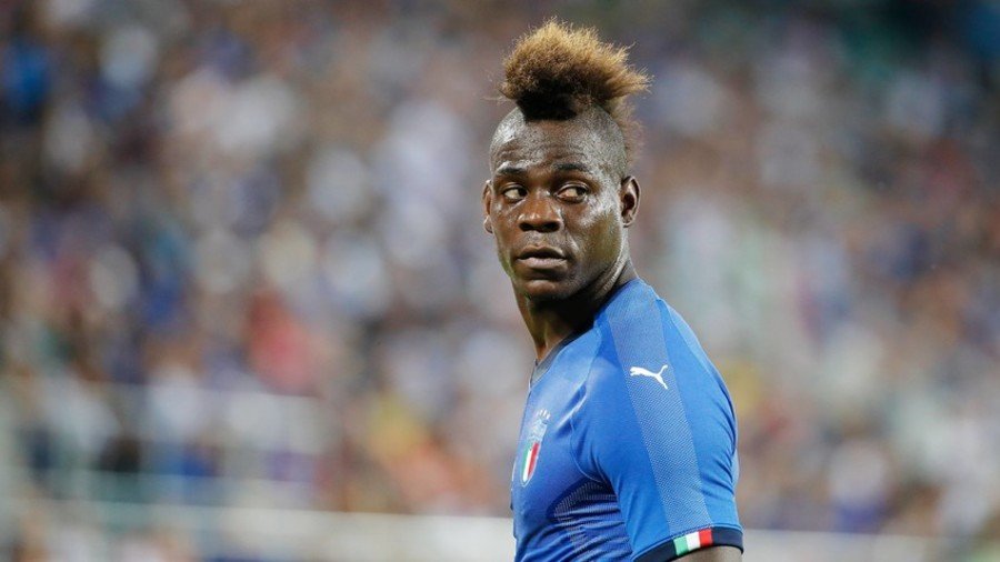 Balotelli tells fans to ‘wake up’ after racist ‘Italian blood’ banner