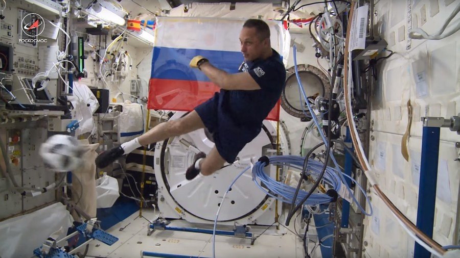 Russian cosmonauts show off football skills in zero-gravity kickabout ahead of World Cup (VIDEO)