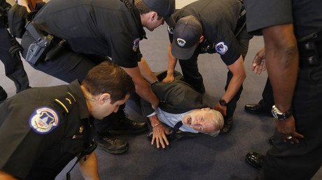 Former CIA analyst dragged from Haspel hearing by Capitol Police after anti-torture protest