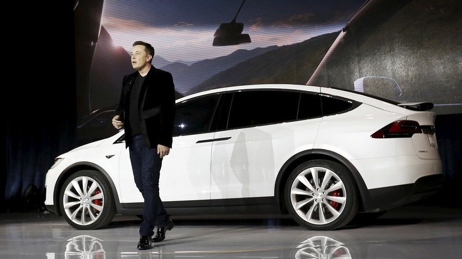 Elon Musk keeps grip on Tesla, promises to solve production problems