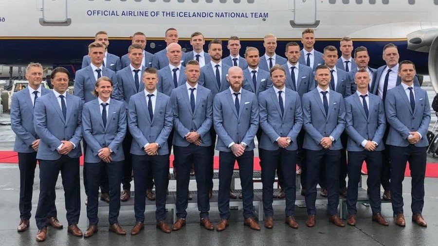 Iceland trolled over suits & shoes combo as Vikings venture to Russia for World Cup (VIDEO)