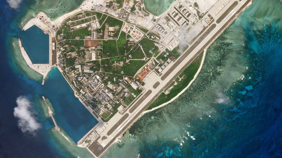 China redeploys missile systems on disputed South China Sea island (SATELLITE PHOTOS)