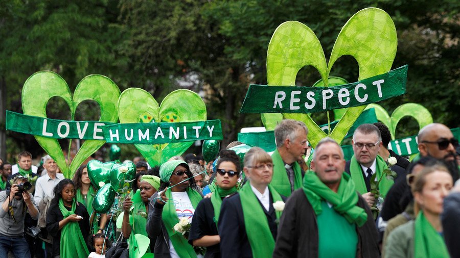 May’s Grenfell ‘regret’ questioned as she spends first anniversary with bankers rather than victims