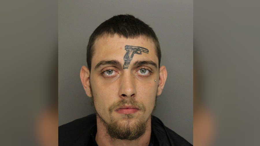 Self-fulfilling prophecy? Man with gun tattoo on face arrested for firearm possession (PHOTO)