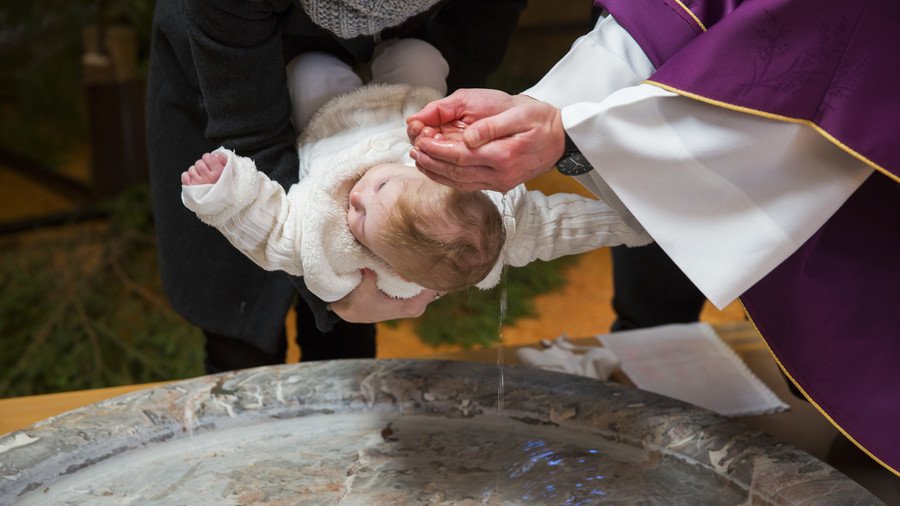 French priest suspended after video of him slapping toddler during baptism goes viral