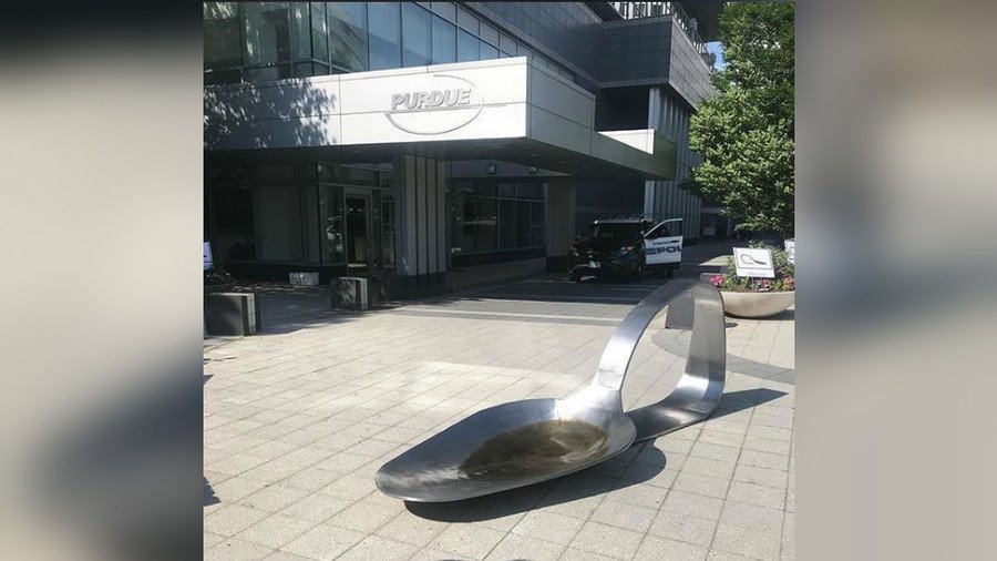 Giant heroin spoon dropped to protest opioid-making pharma (PHOTOS)