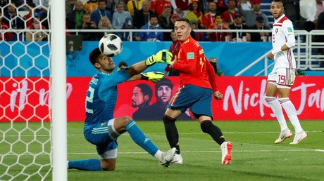 Spain set up last 16 clash with Russia after grabbing late draw against eliminated Morocco