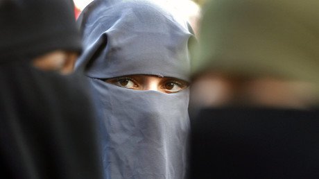 Islamic face veils banned in public buildings by Dutch parliament