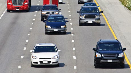 Man in vest dangles on hood of car speeding down Florida highway (VIDEO)