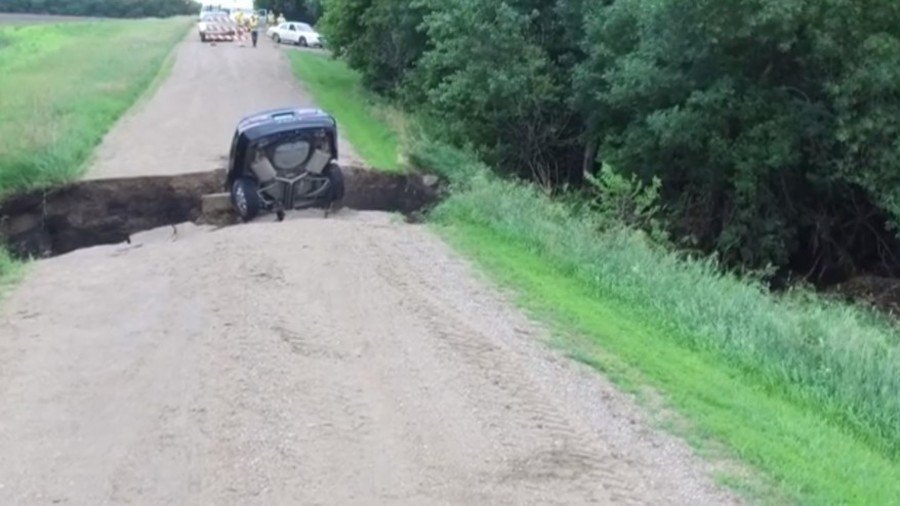 Giant sinkhole swallows motorist alive in stomach-churning incident (VIDEO)