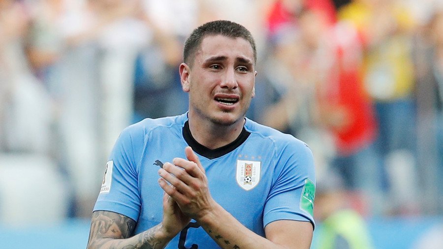 Uruguay defender Gimenez cries on pitch ahead of World Cup exit