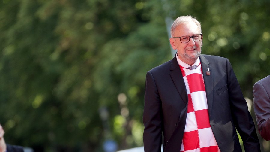 Croatia interior minister celebrates World Cup win by wearing team jersey to EU meeting