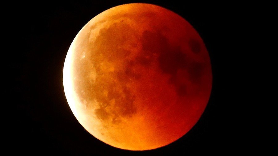 Blood Moon rising: Longest lunar eclipse of the century burns dark red (PHOTO, VIDEO)