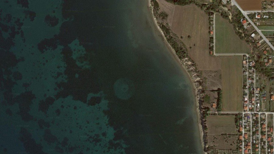 UFO or old pier? Satellite PHOTO of round object beneath water off Greek coast has internet guessing