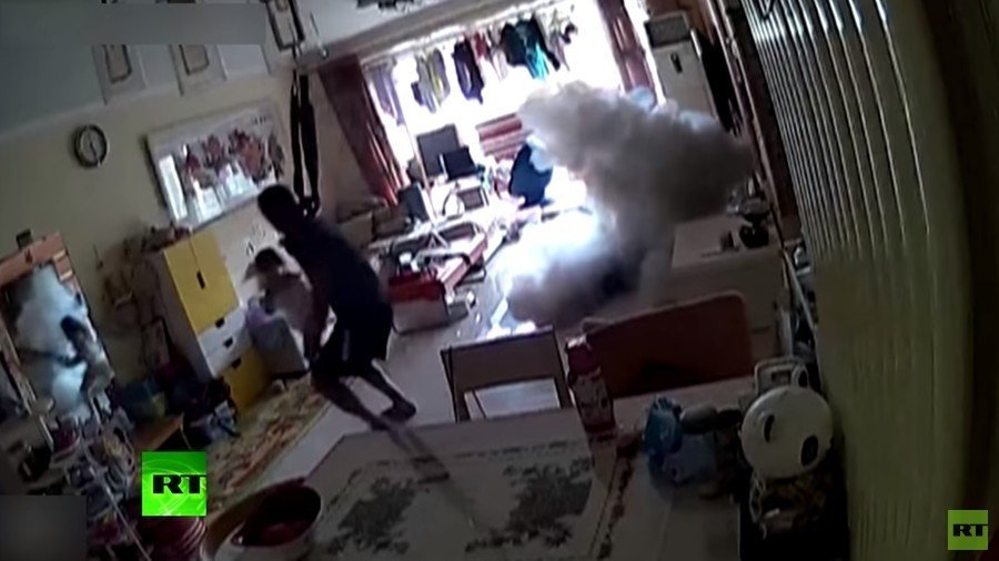 Family flee fiery scooter as charging device explodes in their home (VIDEO)