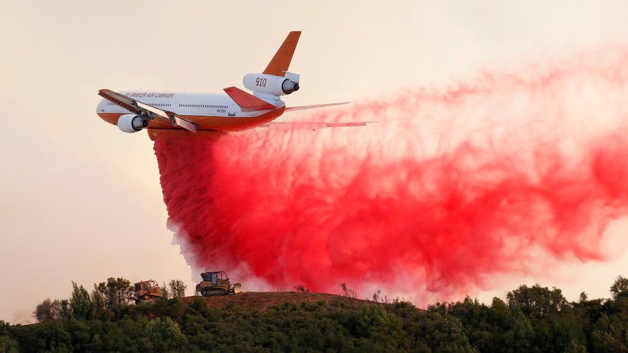 Holy smoke! Dramatic footage captures moment aircraft douses California wildfire (VIDEO)