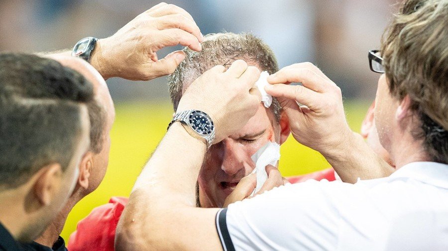 Austrian football club apologizes after linesman hit in the head during Europa League match (PHOTOS)