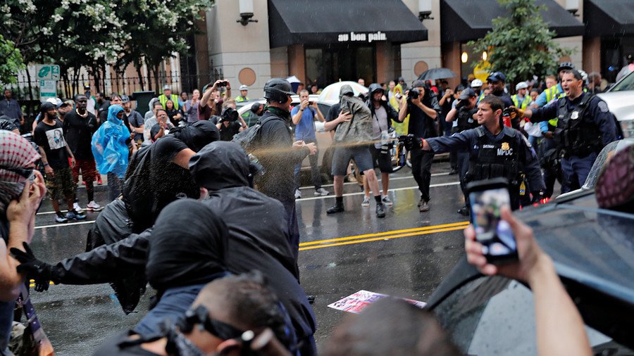 Right, left-wing groups face each other in fiery public confrontations in Boston, Seattle
