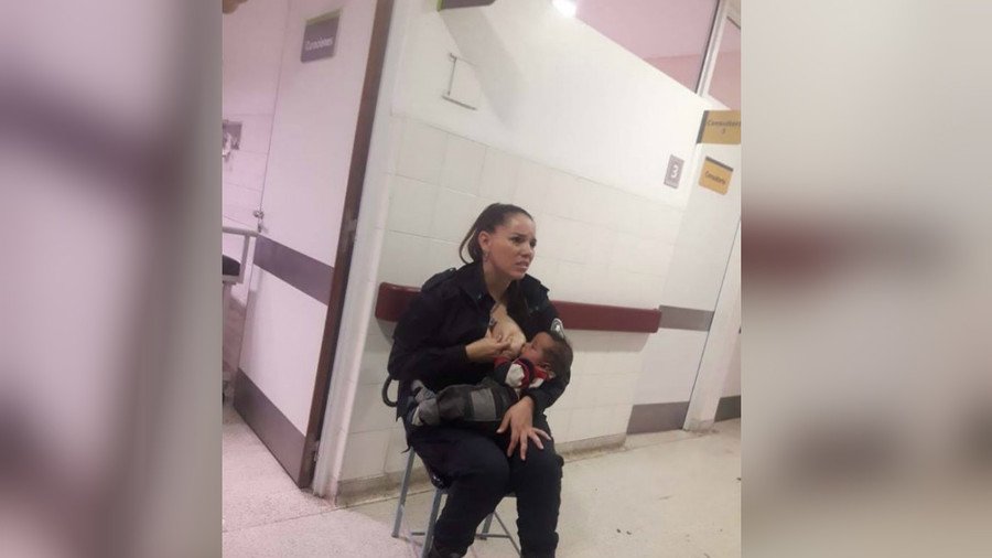 Argentinian cop breastfeeds hungry baby while hospital medics overwhelmed (PHOTO)