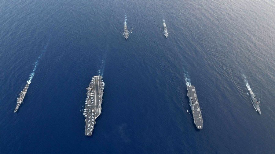 Japan’s largest warship trains with US naval strike group in contested South China Sea