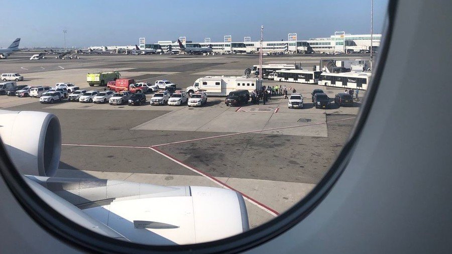 Video from JFK as Emirates plane from Dubai lands with reportedly 100 sick passengers on board 