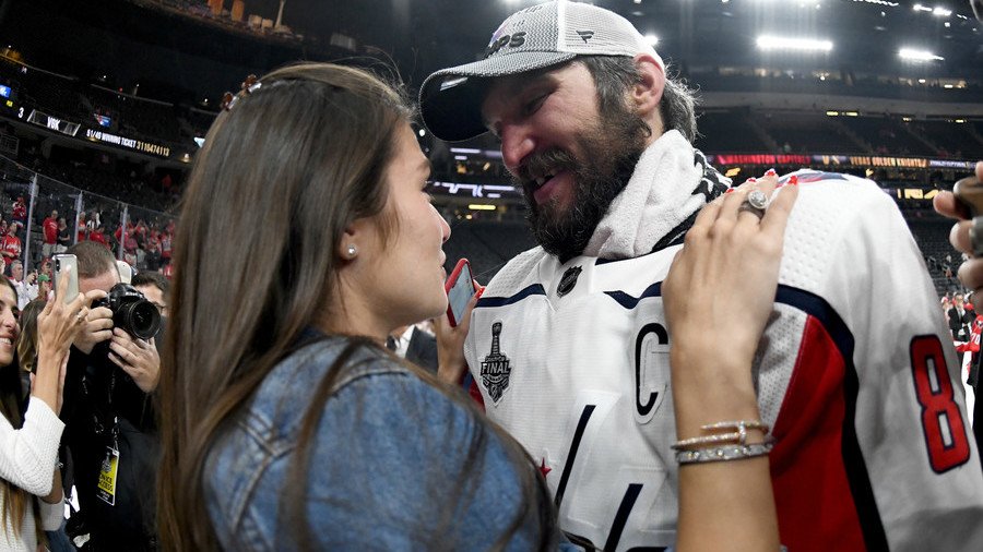 Ovi with the save! Washington Caps star protects wife from flying football (VIDEO) 