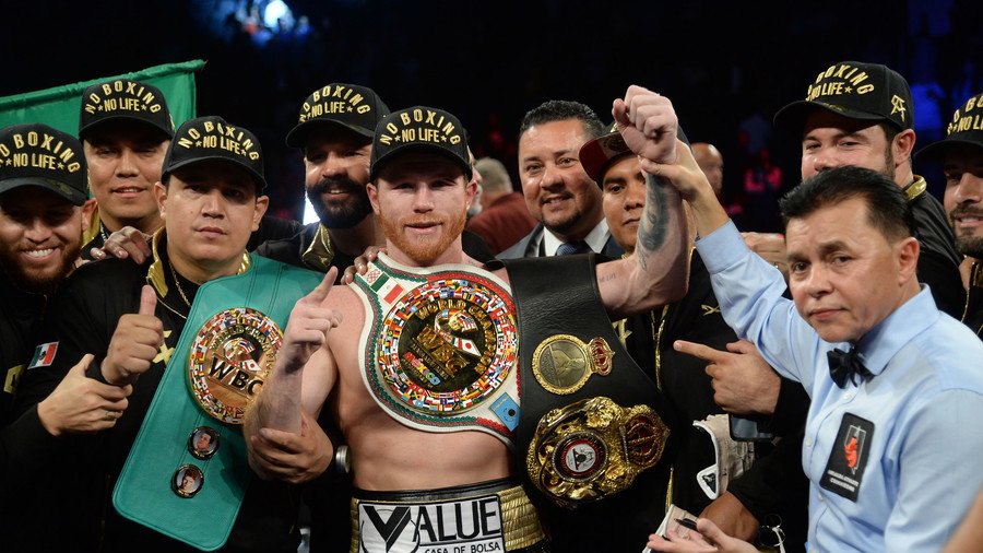 Canelo takes middleweight titles, hands Golovkin 1st career defeat in thrilling rematch