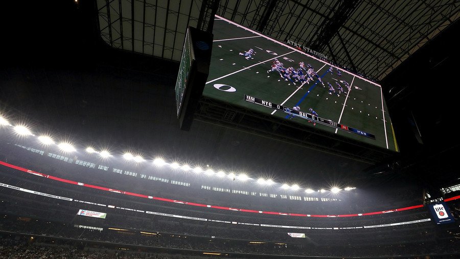 Protesters against police brutality march with coffins outside Cowboys’ stadium in Texas