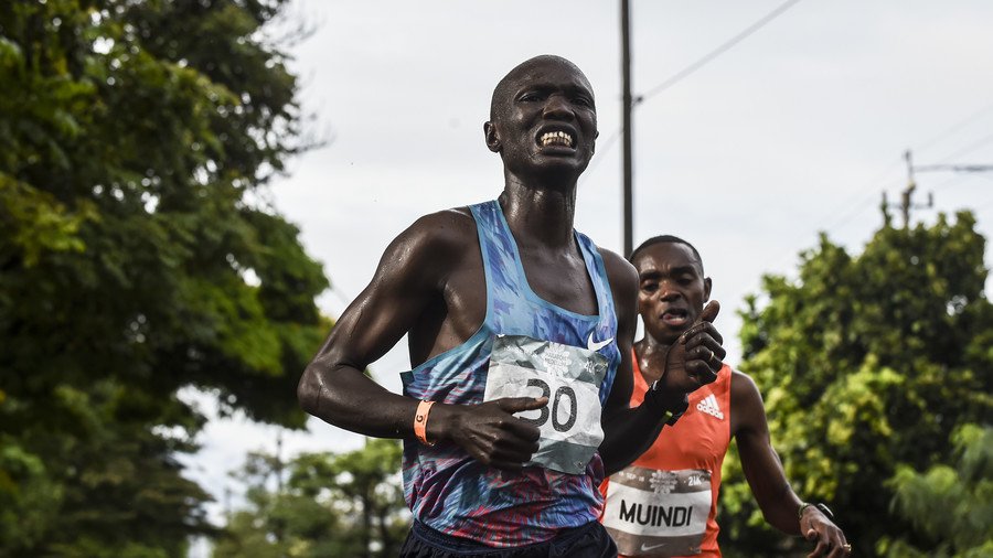 Kenyan runner Joseph Kiprono hit by car while leading half marathon in Colombia