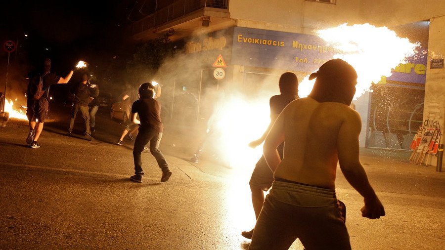 Masked protesters clash with Greek police on anniversary of left-wing activist’s slaying (VIDEO)