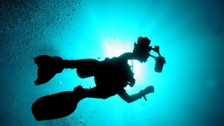 Six rescue divers drown in Malaysia after being caught in whirlpool as they searched for teen