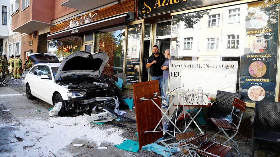 Car drives into group of people in Berlin cafe, at least 5 injured