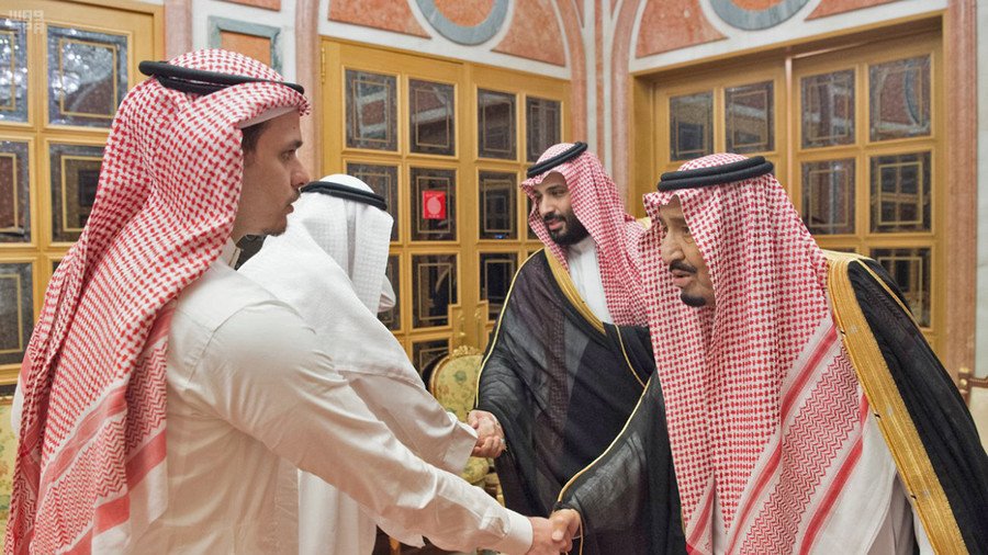 Khashoggi’s son shakes hands with Saudi rulers in awkward meeting after reports of body parts found