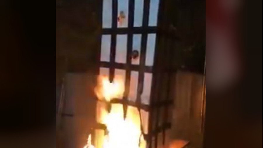 Five arrested over Grenfell Tower effigy burning