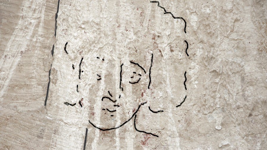 Curly headed & clean shaven: Long lost depiction of Jesus offers totally different portrayal