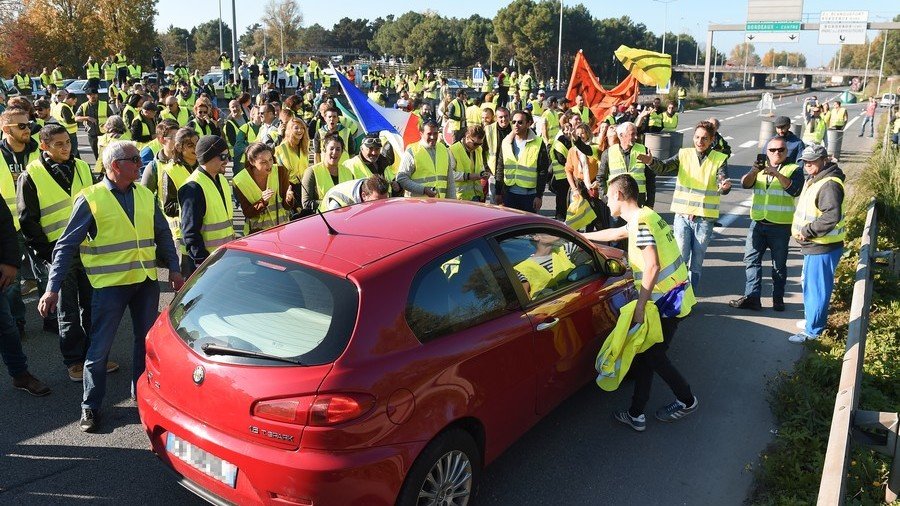 Woman dies in France after driver ‘frightened’ by fuel price protesters ploughs through crowd