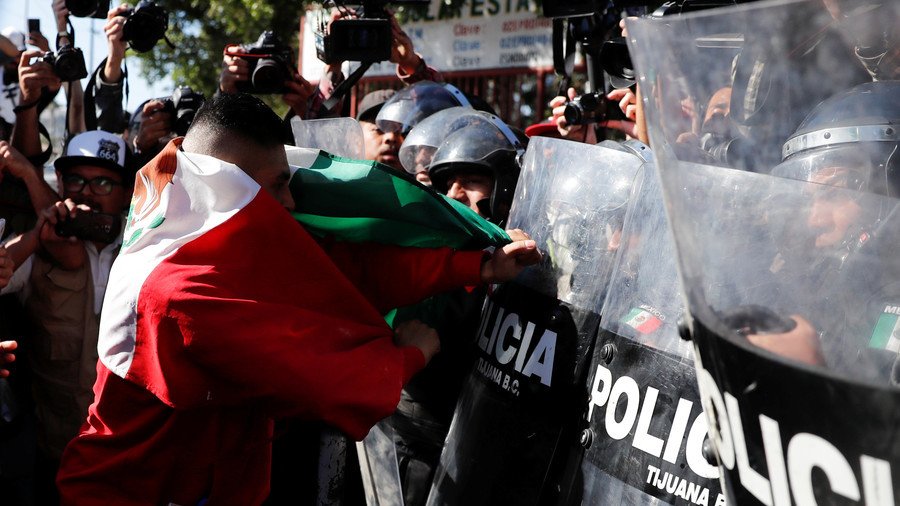 ‘Mexico First’? Riot police face off with protesters against US-bound ‘invaders’ in Tijuana (VIDEOS)