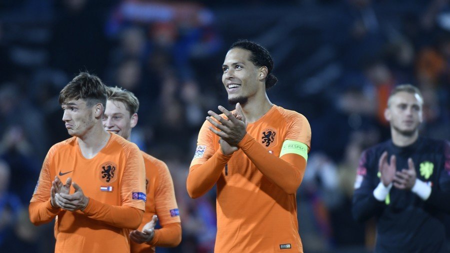 Dutch hero Van Dijk consoles tearful referee moments after scoring late ...