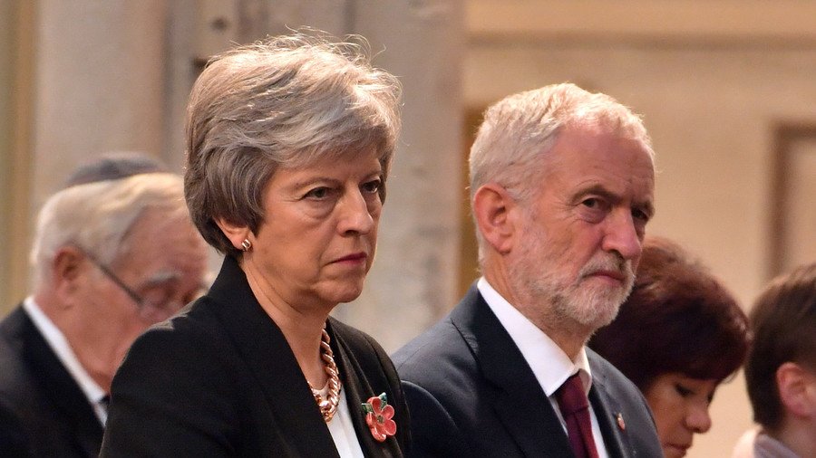 Theresa May and Jeremy Corbyn battle in Parliament after UK and EU agree to deal