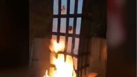 Five arrested over Grenfell Tower effigy burning