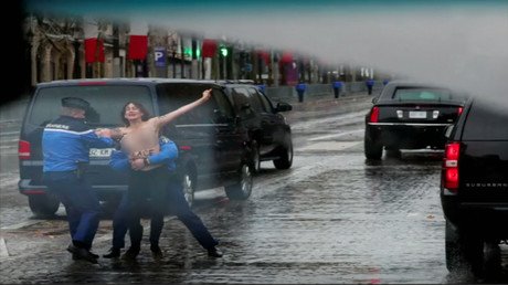 Topless FEMEN protester almost throws herself at Trump’s motorcade in Paris (VIDEO)