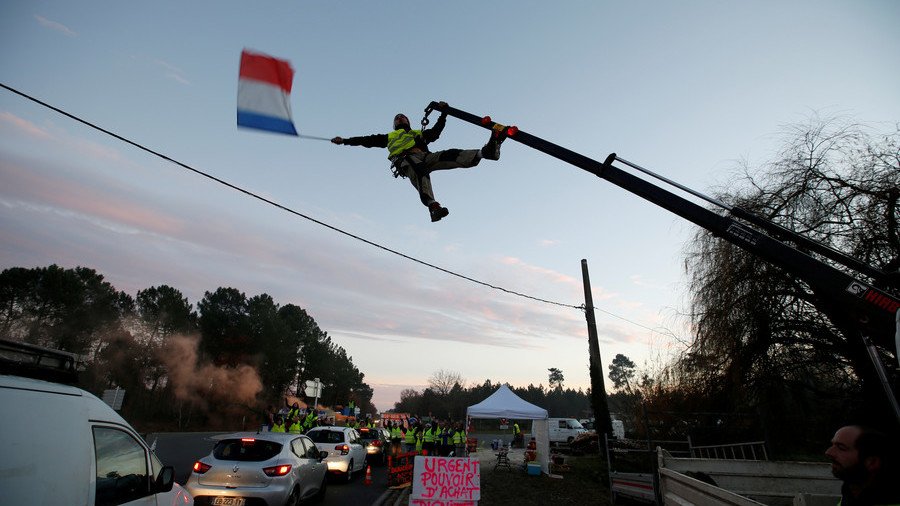 Paris abandons fuel tax hike after sweeping protests – French PM